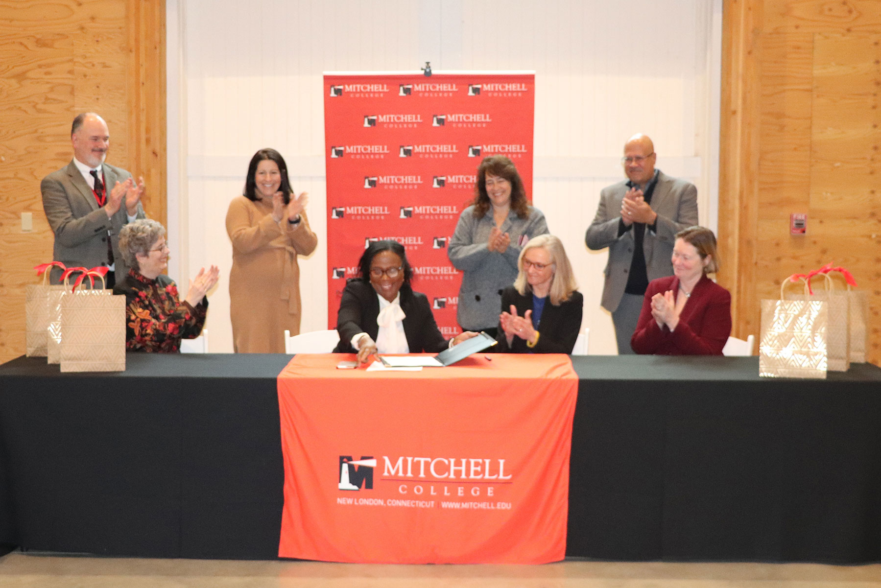 Signing ceremony with Mitchell and University of St. Joseph